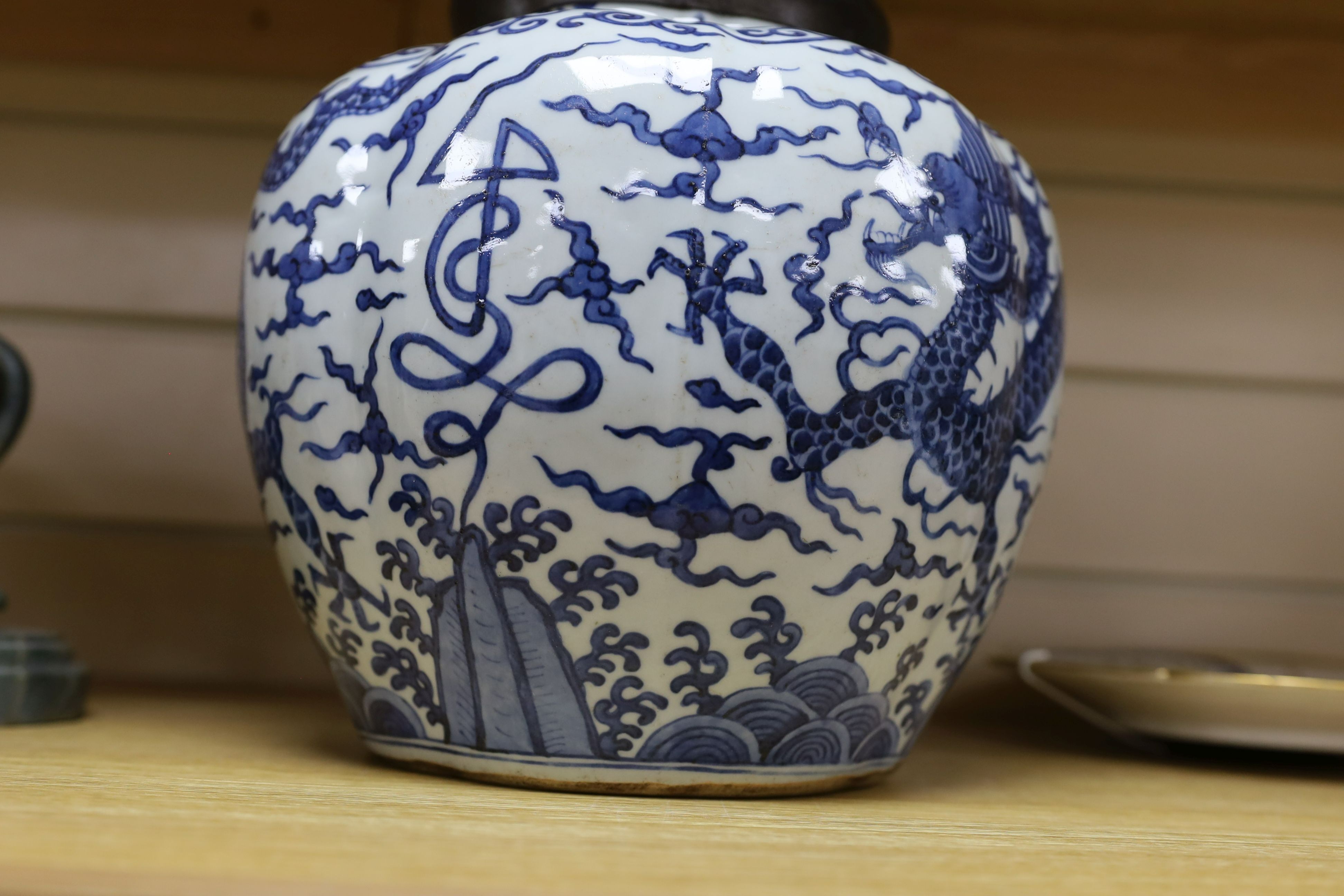 A Chinese blue and white ‘dragon jar, Wanli mark and possibly of the period, 23 cm high